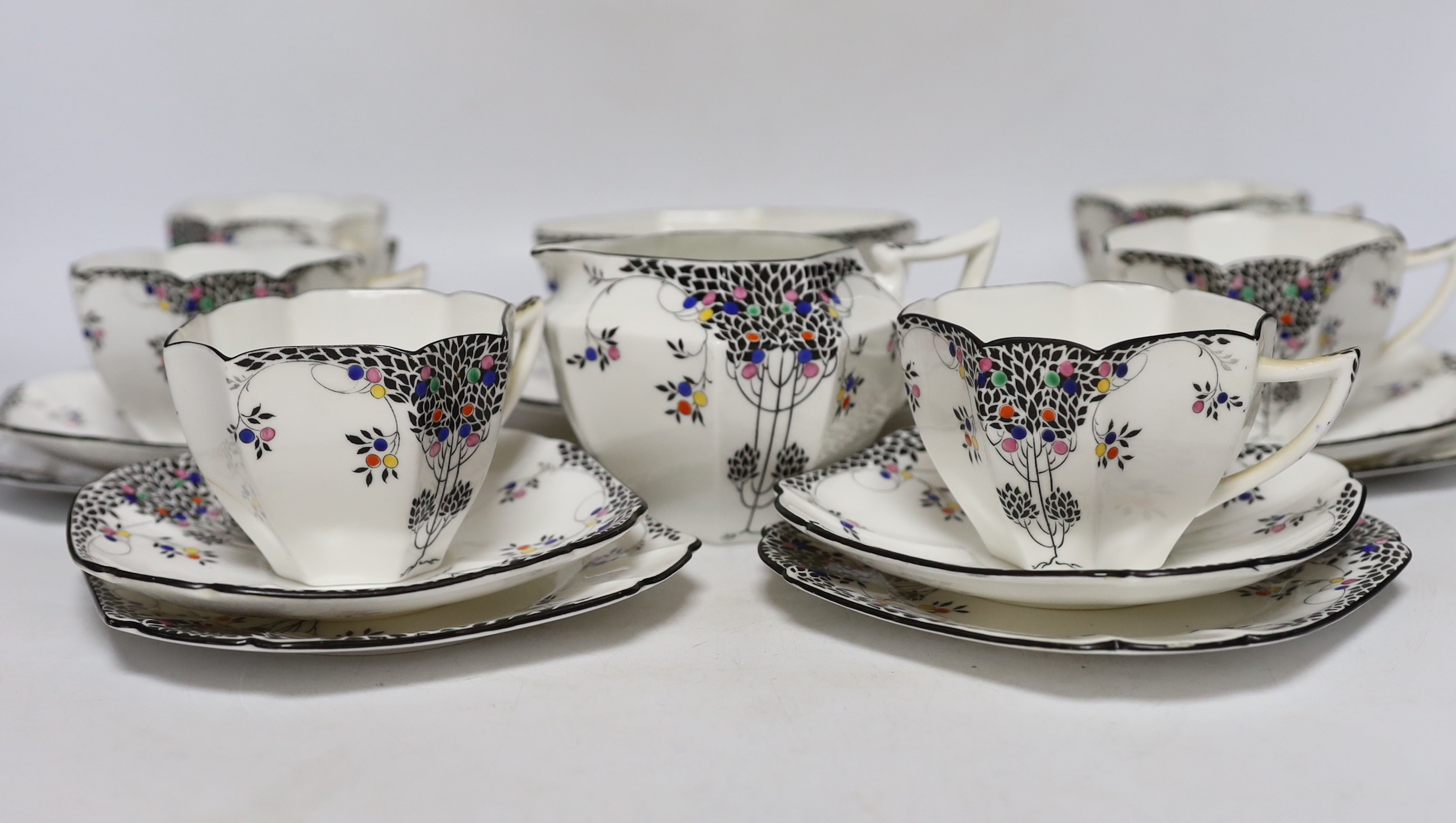 A Shelley Black Leafy Tree pattern part tea set comprising trios, milk jug, bowl and sandwich plate